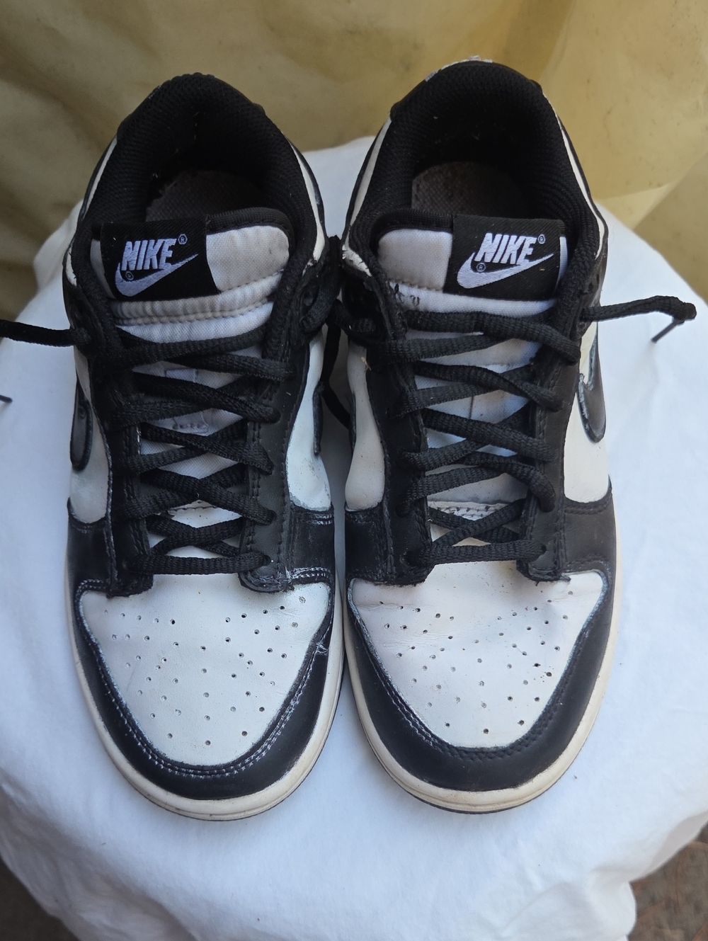 Classic and versatile Nike Dunk Low in the highly coveted "Panda" (White/Black)